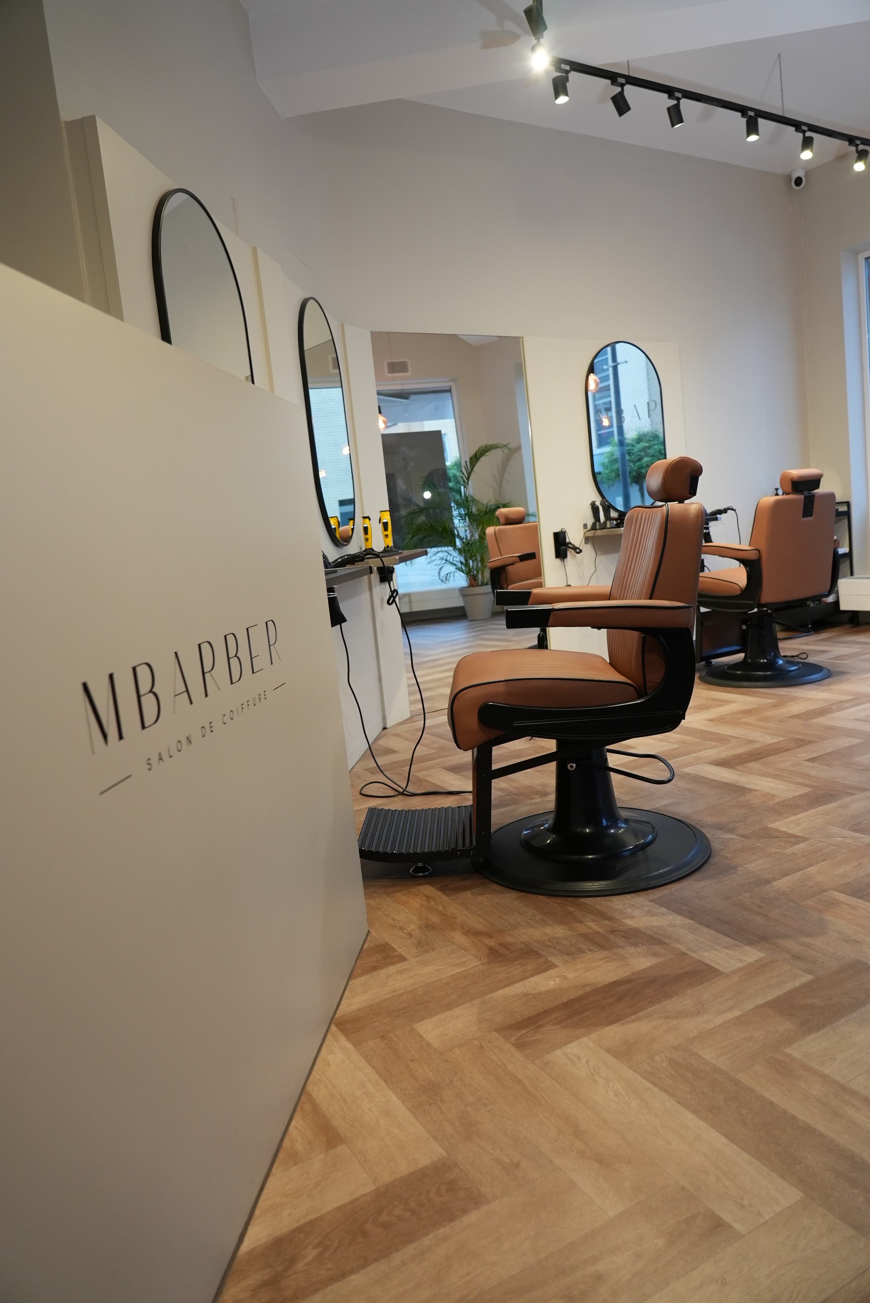 Professional barbershop interior at MBarber Brussels